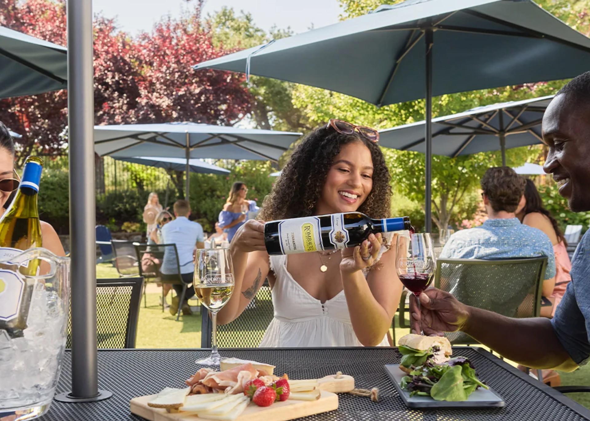 Guests enjoying wine and food at the final winery stop in Amador County