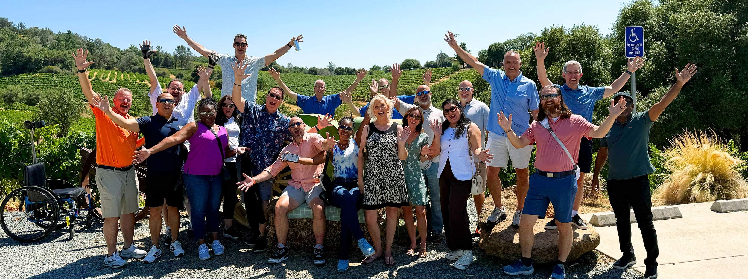 Corporate group toasting at a premium winery